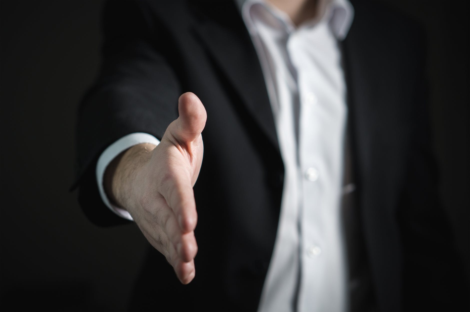 close up of human hand - How to make money from debt