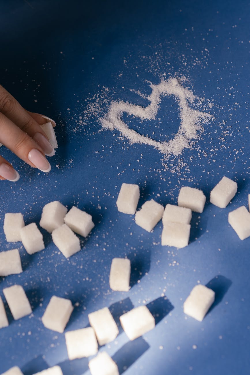 white sugar cubes on blue textile